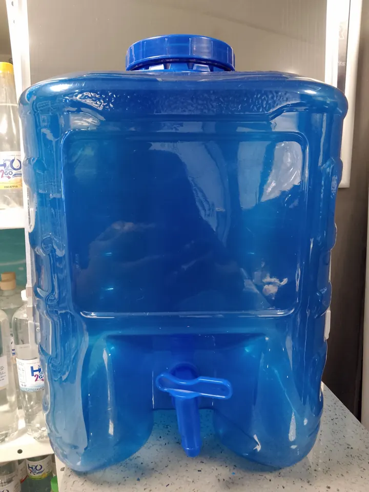 Blue water container with a tap